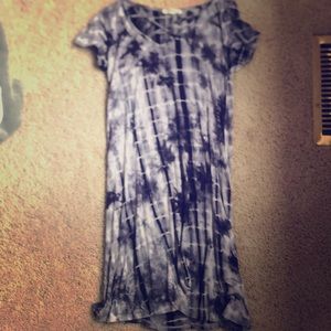 Soft, short sleeve, flowy dress. Cross at chest.
